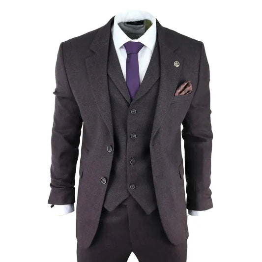 Men's dark brown herringbone tweed 3 piece suit with blazer, waistcoat, and trousers, featuring a turn-down collar, pocket square, and tailored fit.