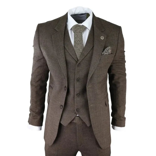Men's brown herringbone tweed 3-piece suit with blazer, waistcoat, and trousers, featuring a turn-down collar, pocket square, and tailored fit