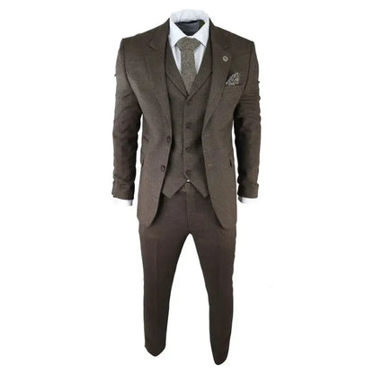 Close-up of men's brown herringbone tweed 3-piece suit with blazer, waistcoat, white shirt, and matching tie, detailed fabric texture