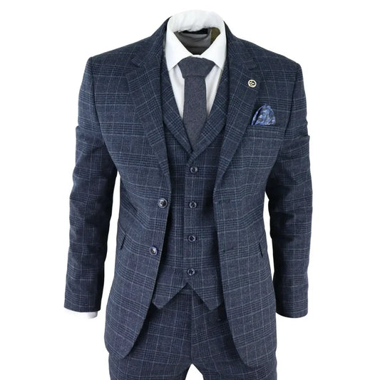 Men's navy blue check tweed 3-piece suit with tailored fit, notch lapel blazer, waistcoat, and matching trousers, styled with a white shirt and tie.