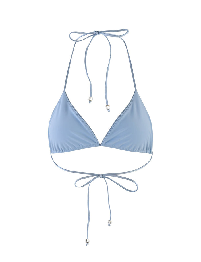 A TIGERMIST AVE BIKINI TOP in Blue Sparkle featuring triangle cups. The halter strings tie around the neck, while the long strings, ending in silver beads, tie around the back. The fabric is smooth with a slight sheen.
