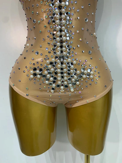 Candice rhinestone pearl mesh bodycon bodysuit for women. Luxury sparkly outfit for birthdays, stage wear, and nightlife events.