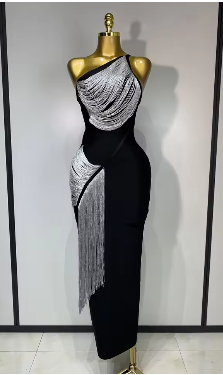 Cindy bandage dress with an asymmetric slanted collar and silver tassel fringe in a bodycon mini silhouette.