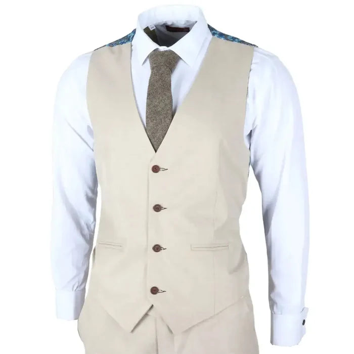 Men's beige tailored fit wedding suit vest with brown buttons, worn over a white dress shirt with blue patterned shoulder accents, paired with a brown herringbone tie, SKU: IM04_suit_Beige_34