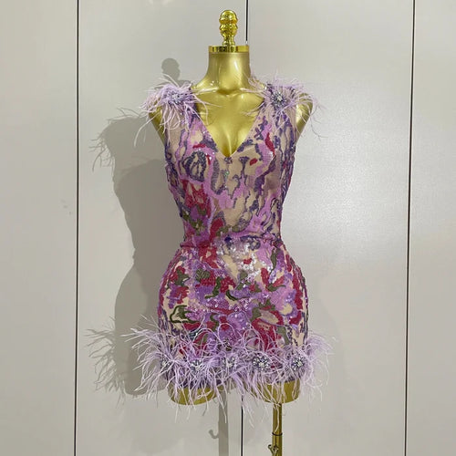 Celebrate in style with the Karina rhinestone feather embroidered bodycon dress. Elegant party dress for birthdays, cocktails, and special events.