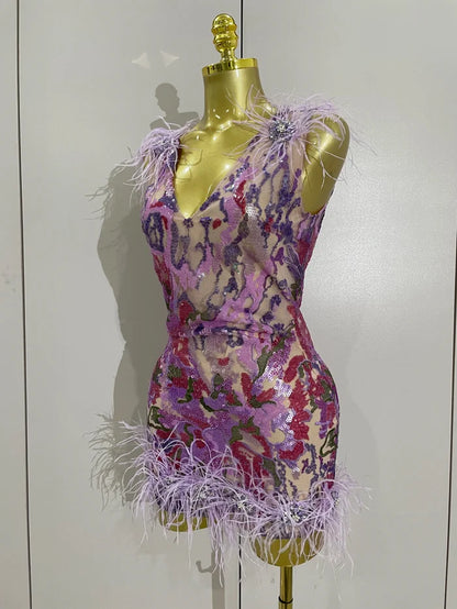 Celebrate in style with the Karina rhinestone feather embroidered bodycon dress. Elegant party dress for birthdays, cocktails, and special events.