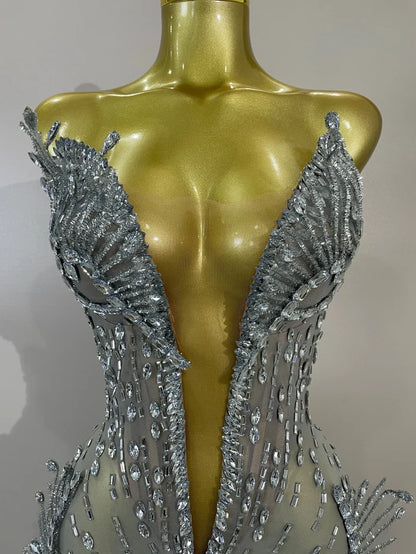 Kiara deep V silver diamond mesh mini dress for women. Sexy sparkly outfit for birthdays, nightclub, and stage events.