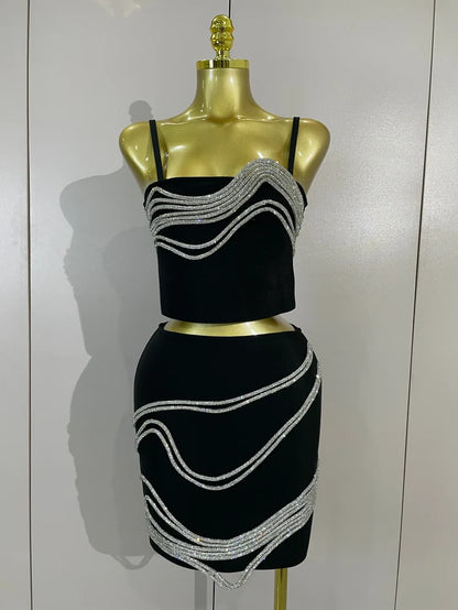 Shine in the Kristi diamond chain two-piece bandage mini dress set. Sexy bodycon outfit for parties, birthdays, clubs, and special events.
