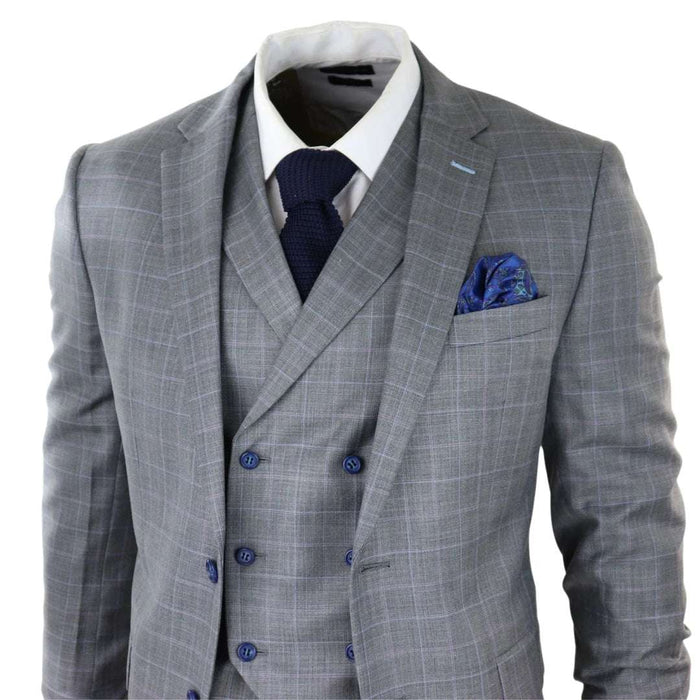 Men's light grey check suit with double-breasted waistcoat, white shirt, navy tie, and blue pocket square, front view