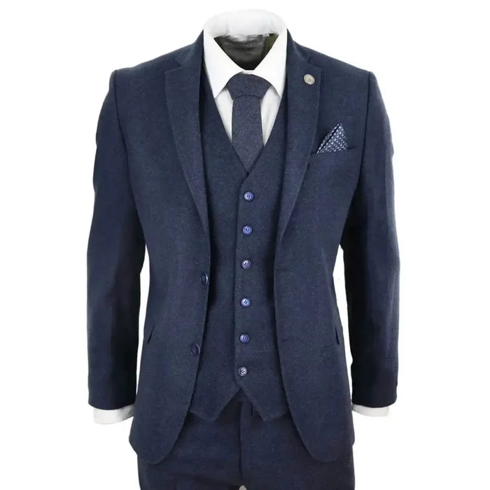 Men's navy blue wool tweed suit with tailored fit, includes blazer, waistcoat, and trousers, perfect for formal occasions.