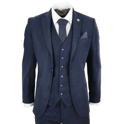 Men's navy blue wool tweed suit with tailored fit, includes blazer, waistcoat, and trousers, perfect for formal occasions.