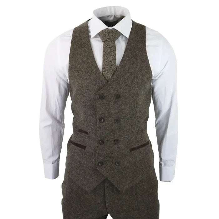 Back view of men's brown tweed 3-piece suit with tailored fit, structured shoulders, and classic vintage style, formal attire.