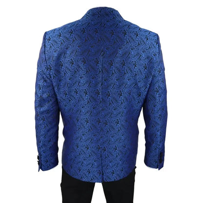 Back view of men's blue paisley tuxedo jacket with structured shoulders and detailed pattern, paired with black trousers