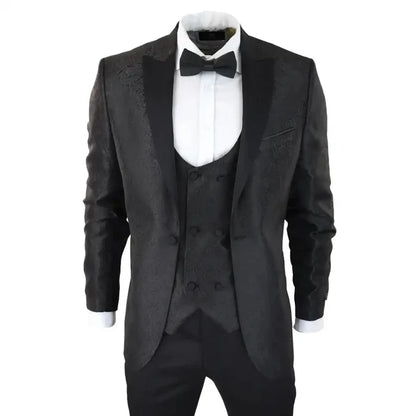 Men's black paisley tuxedo blazer with satin peak lapels, matching waistcoat, white dress shirt, and black bow tie, formal evening wear