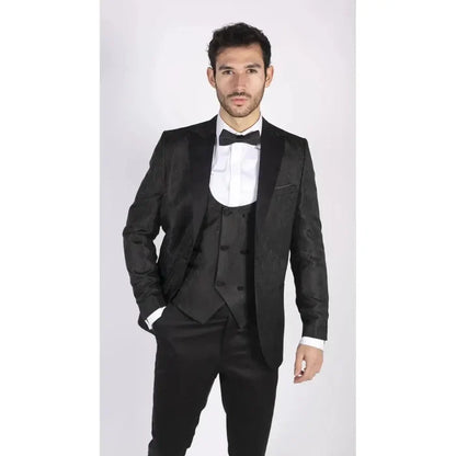 Front view of a man in black tuxedo with paisley pattern, white shirt, and black bow tie, stylish formal suit for events