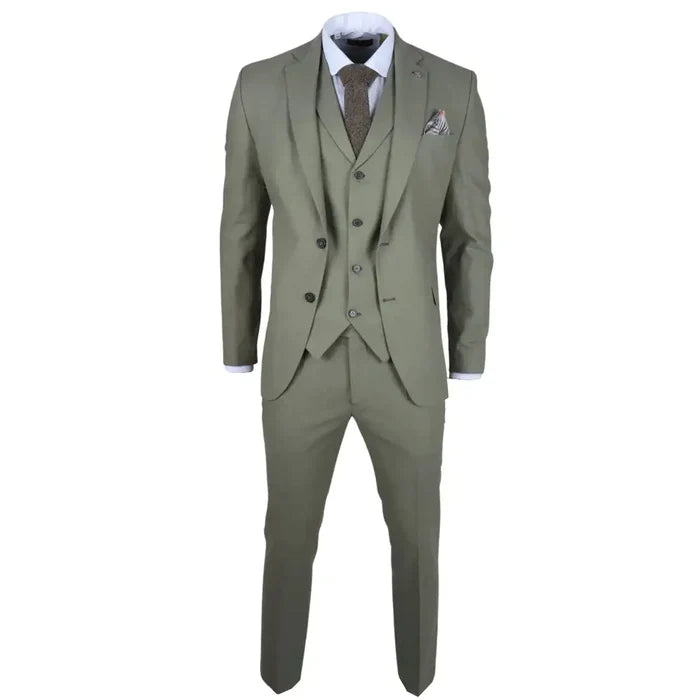 Close-up of sage green men's suit jacket with notch lapel, pocket square, and button details, suitable for summer weddings